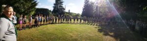 Youth gathered in a circle for Greater Christchurch Zone Cub Leadership Camp