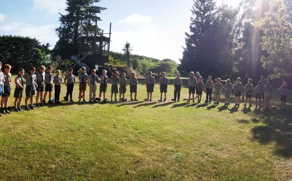 Youth gathered in a circle for Greater Christchurch Zone Cub Leadership Camp